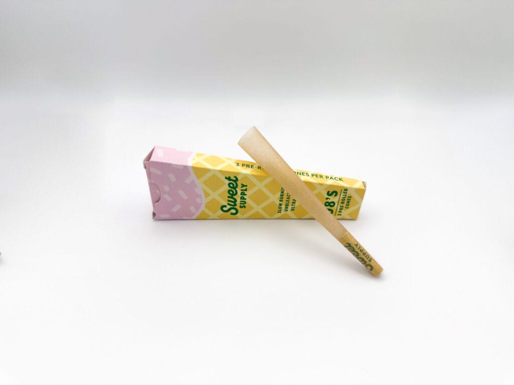 custom pre-roll cone 3 pack on its side with pre-roll cone