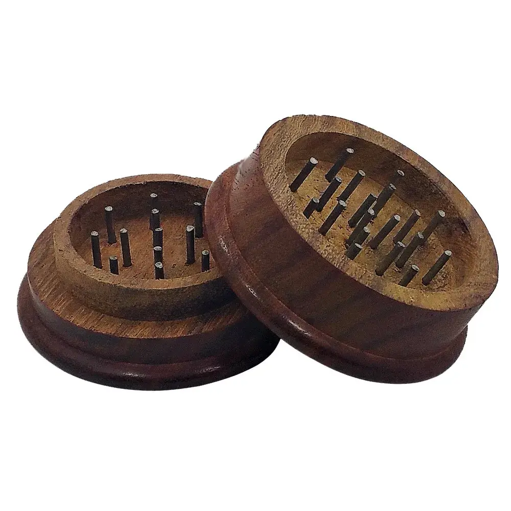 small open dark wooden grinder