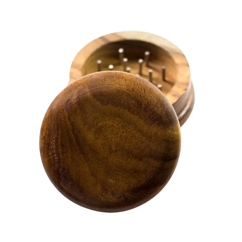 open small dark wooden grinder