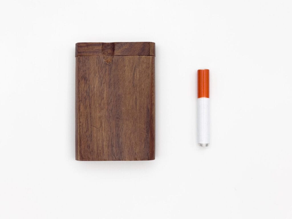 Wooden dugout with one hitter