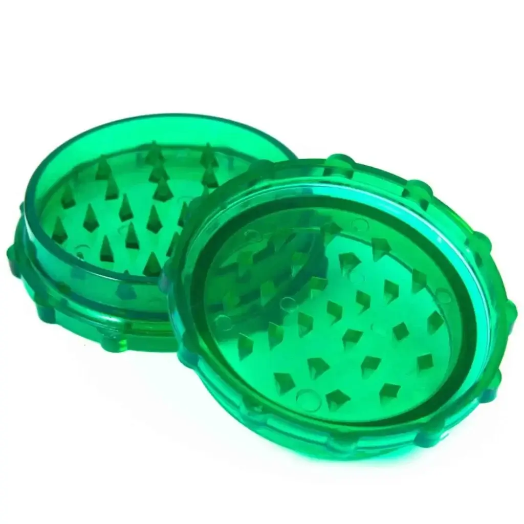 open green plastic grinder
