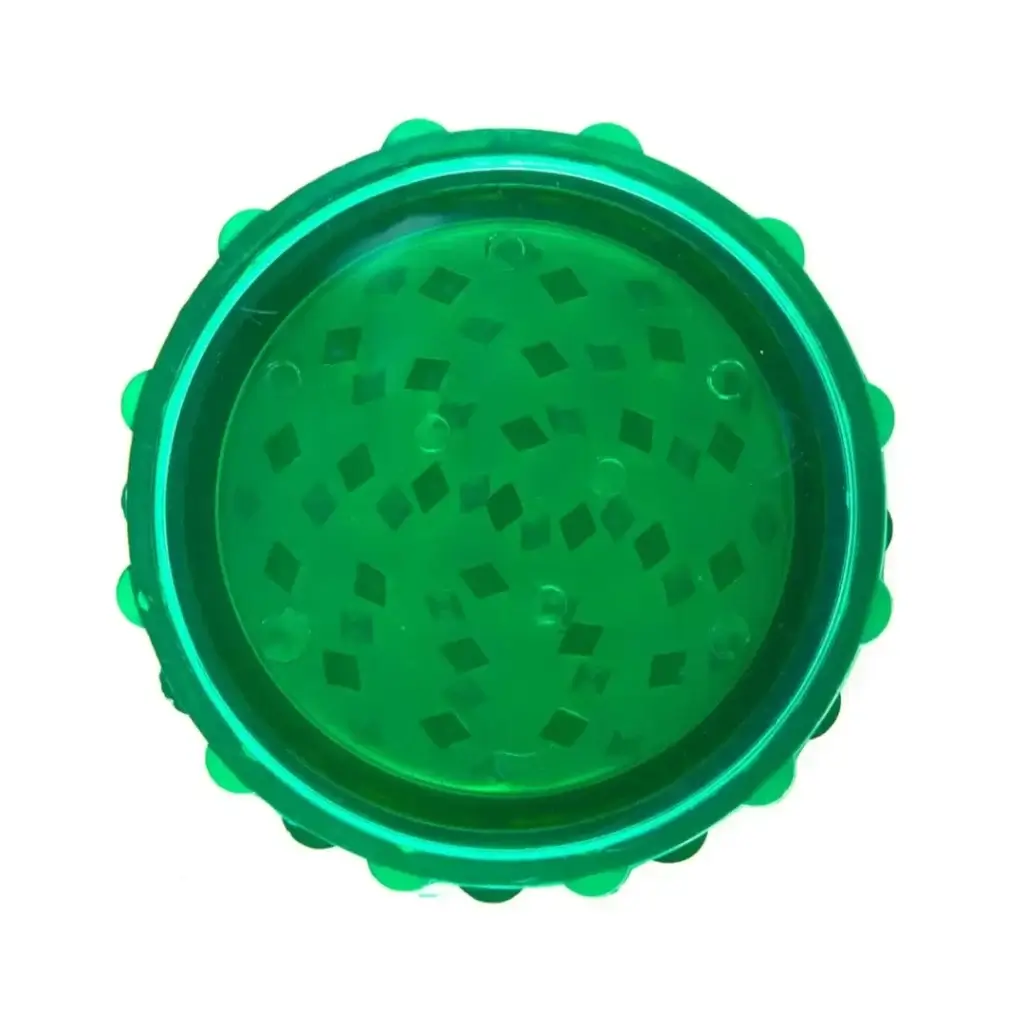 top of closed green plastic grinder