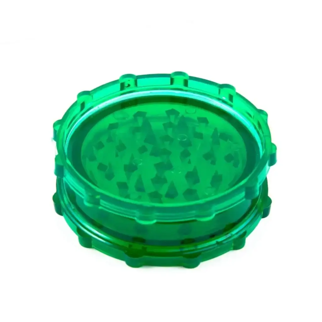 closed green plastic grinder
