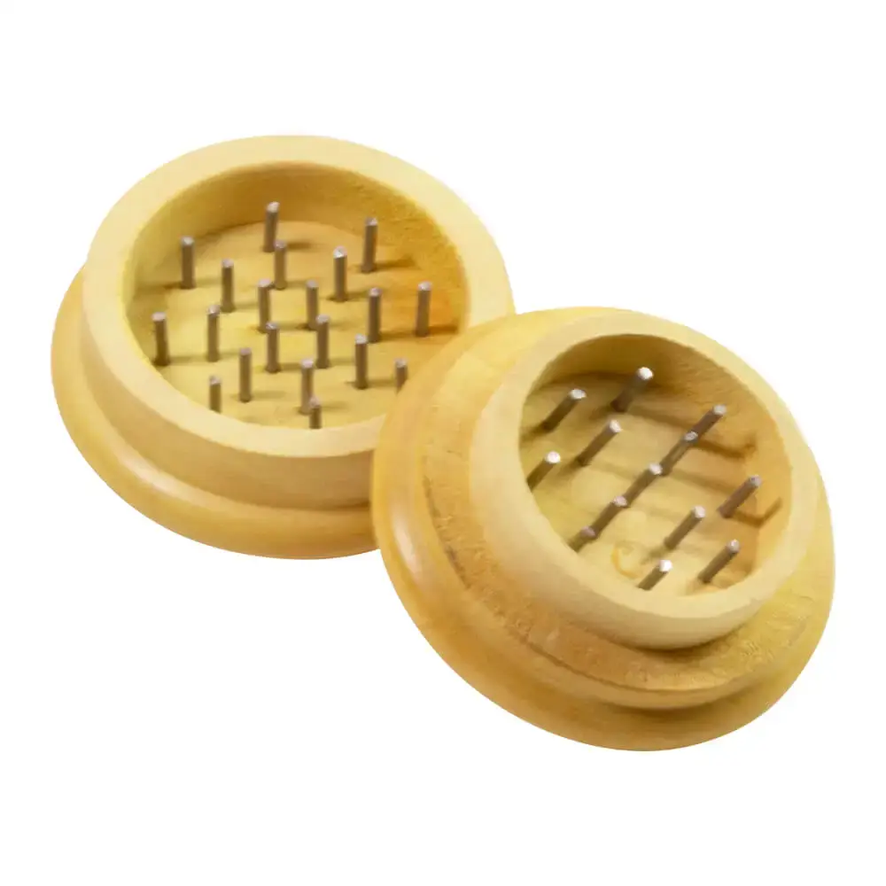open light wood small grinder