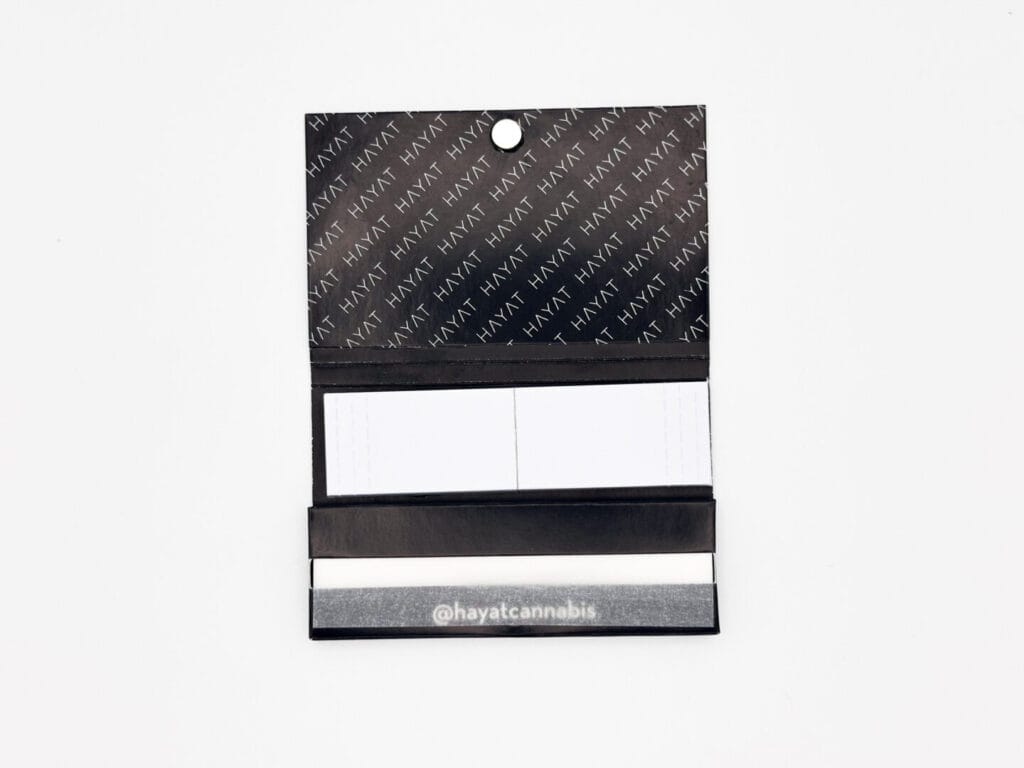 inside of custom printed rolling papers with magnetic closure