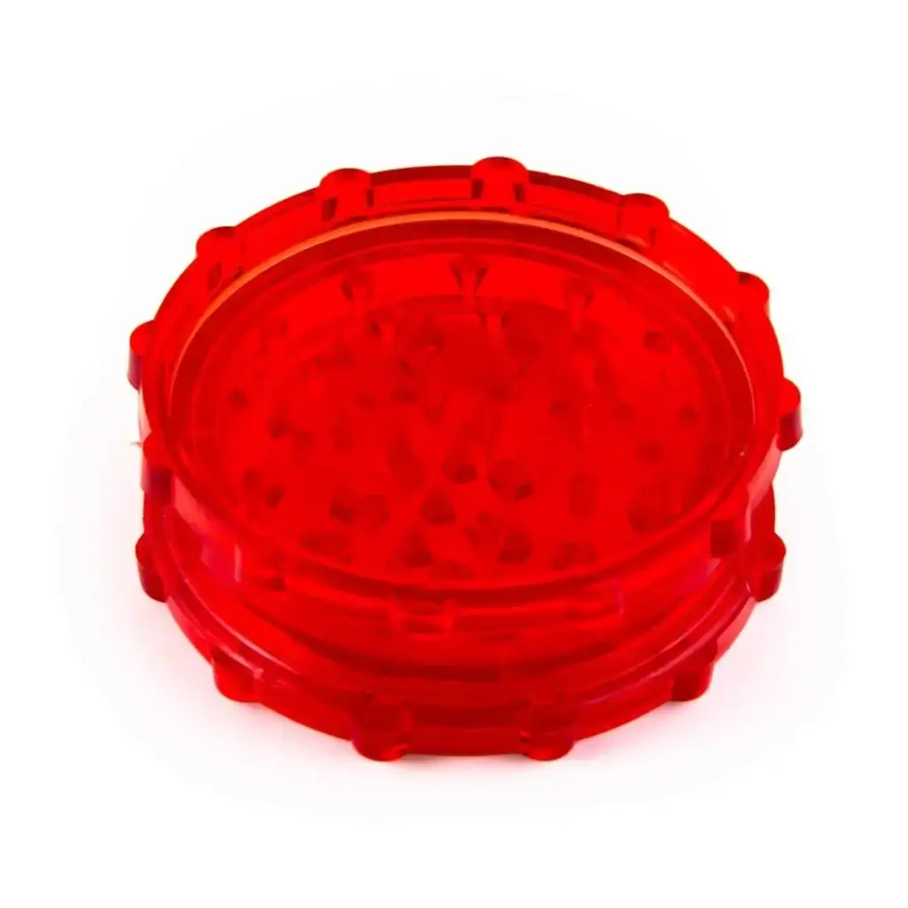 closed red plastic grinder