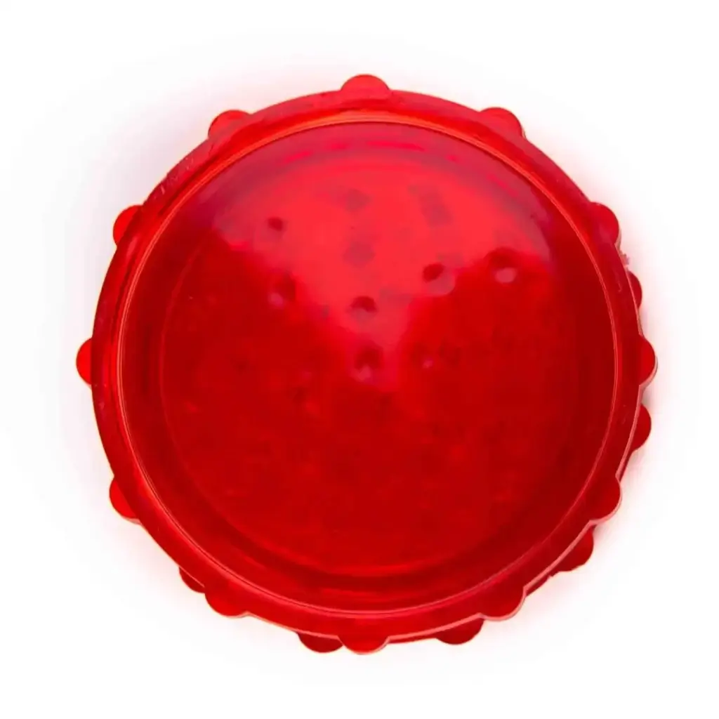 top of closed red plastic grinder