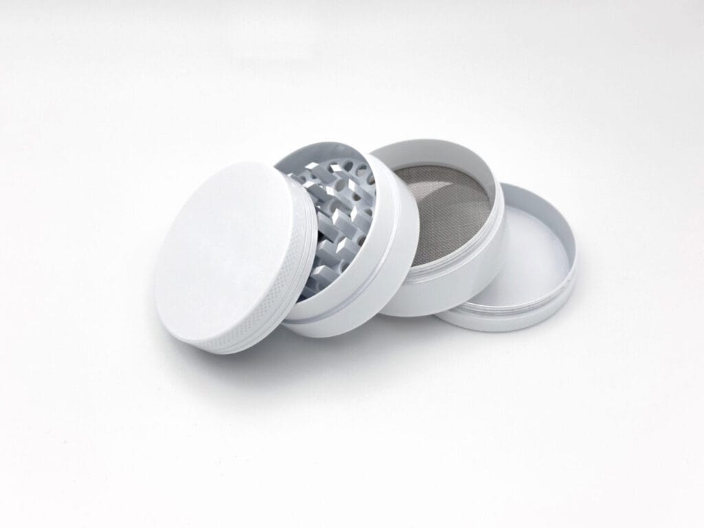 white open 4 piece grinder