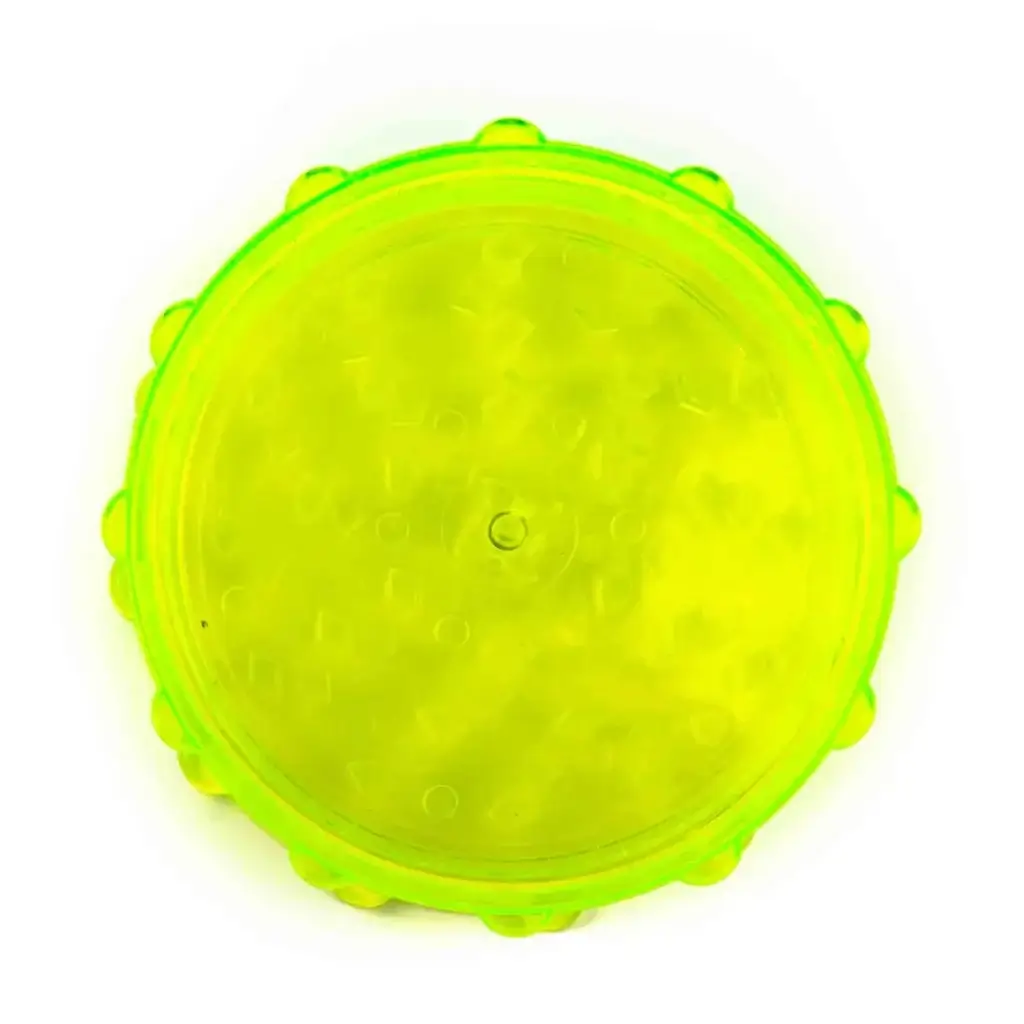 top of closed yellow plastic grinder